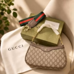 Gucci Bag with extra belt            24